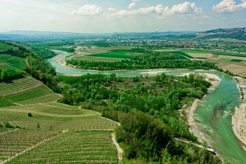Tanaro river and vineyards, Barbaresco area, toned