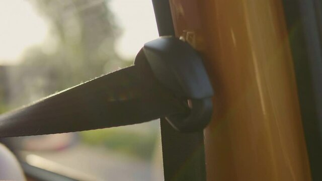 Close Up of Seat Belt Inside driving car in 4K Slow motion 60fps
