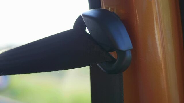 Close Up of Seat Belt Inside driving car in 4K Slow motion 60fps