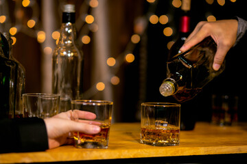 Celebrate whiskey on a friendly party in  restaurant