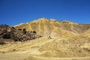 multicolored hills of earth and rock