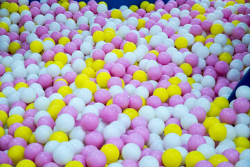 many colorful balls in the play room