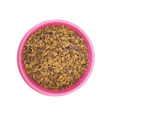 Obraz na płótnie Canvas Cat food in a pink dish on white background, top view