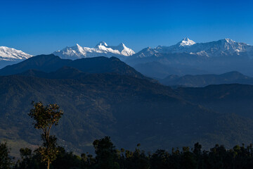 Fototapeta na wymiar Beautiful landscape of Himalayan snow mountains from Chaukori, Uttarakhand, India