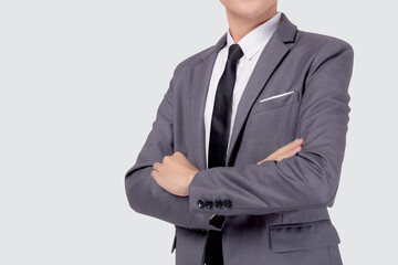 Closeup portrait businessman in suit with crossed his arms standing isolated on white background, young asian business man is manager or executive having confident is positive with success.