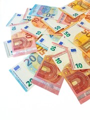 Paper money of the euro on a white background neatly laid out, straight, smooth. Denomination twenty, ten, fifty, five euros. Savings. Saving. Credit. Spare pillow for a rainy day.