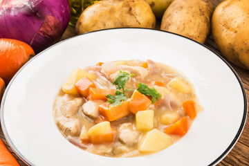 Boiled chicken breast with cheese potatoes and carrots
