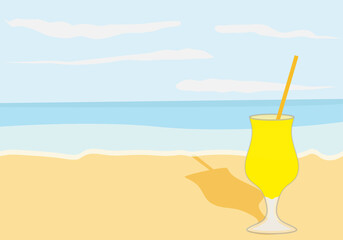 Playa con una copa de refresco de limón.