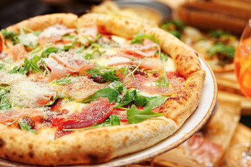 Pizza with prosciutto ham and parmesan, toned