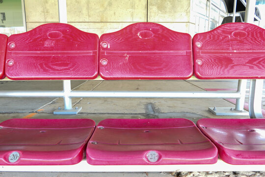 Row Of Red Plastic Stadium Seats