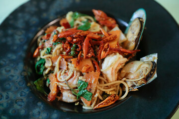 Spaghetti with Spicy prawn and Mixed Seafood, focus selective.