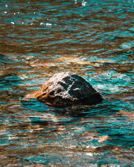 Rock in river