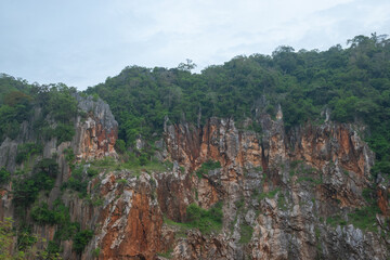 Rock mountain with green forest