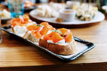Bruschettas with smoked salmon and cream cheese, toned