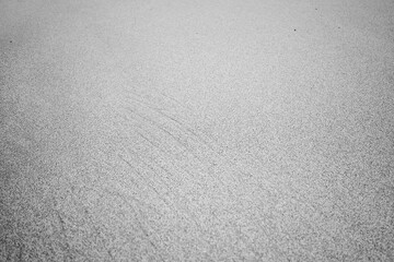 Sand of a becah in black and white