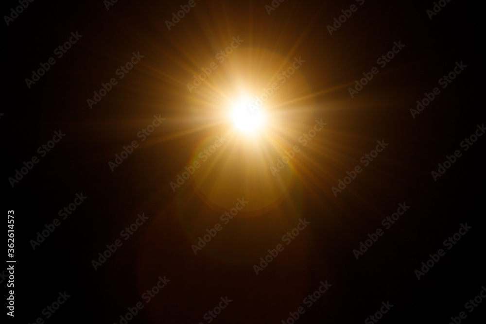 Poster Easy to add lens flare effects for overlay designs or screen blending mode to make high-quality images. Abstract sun burst, digital flare, iridescent glare over black background.