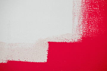 carmine and white wall detail, during work