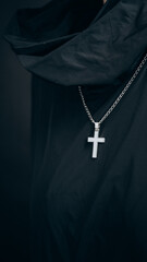 cross jewelry on the girl's chest