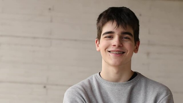portrait of young teenage boy smiling