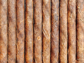 Tobacco smoking concept. Close view of the cigarillos. Twisted tobacco leaves.