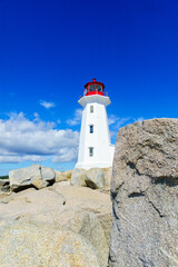 Fototapeta na wymiar Lighthouse of the fishing village Peggys Cove