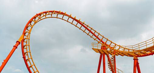 Roller coaster in the amusement park. 