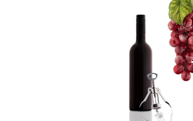 Bottle of wine with grape and corkscrew. Copy space.