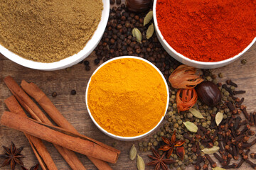 Spices with wooden background