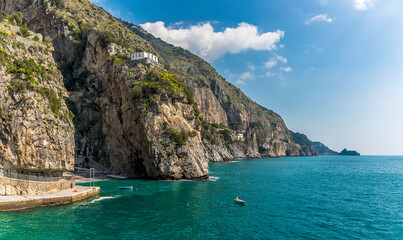 The cliffed coastline at Marina di Praia, Praiano, Italy looking towards Amalfi