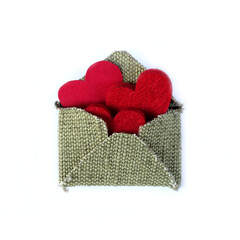 Rustic envelope with love hearts.