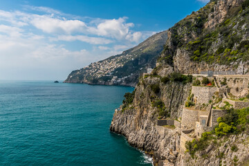 Fototapeta na wymiar A view along the cliffed coastline at Marina di Praia, Praiano, Italy looking towards Positano