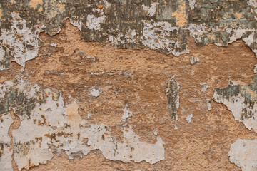old cracked wall requiring plaster repair and paint