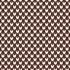 Seamless surface pattern with herringbone motif. Repeated chevrons wallpaper. Zigzag lines. Jagged triangular waves