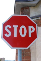 Road sign with stop sign