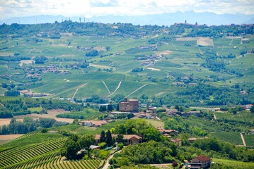 Fototapeta na wymiar View of the Langhe hills with the Castle of Grinzane Cavour