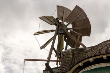 View of a small wind wheel, wind rose, on a historic windmill