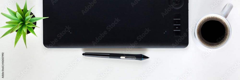 Fototapete Graphic tablet on a white empty background. Copy space. Computer graphics desk. Panorama