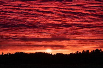Fototapeta premium Red sunset with storm clouds