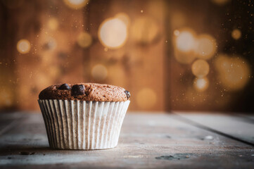 Chocolate muffin with bokeh background