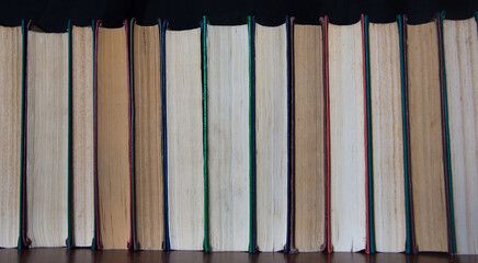 stack of books on black background