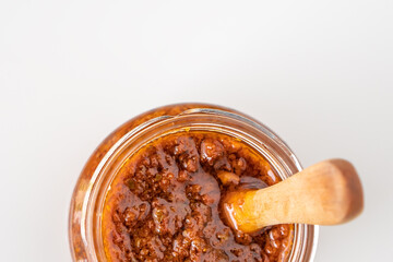 Fresh homemade italian rosso red sundries tomato chili pesto sauce health food cook recipe made from spice pepper herb parmesan cheese nuts for healthy vegetarian vegan meal 