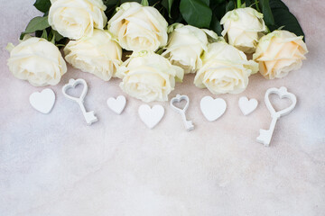 a bouquet of white roses, keys, hearts and free space for text 