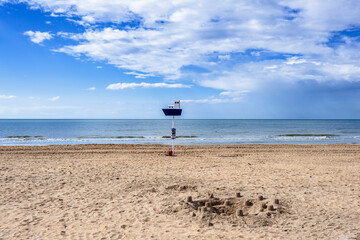 Fototapeta na wymiar sign and sand castle on the beach of Ostend. Belgium