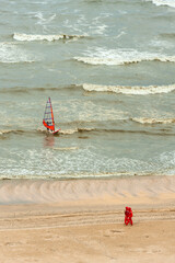 windsurfing and  beach lifeguards on Ostend beach, Belgium