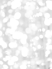 blurred bokeh light defocused background and textured for Christmas , New Year holidays party and celebration background, black and white colour