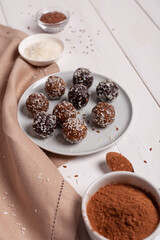 Energy balls on a plate with ingredients