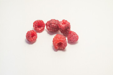 Raspberries isolated on white background, close-up