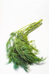bunch fresh, green dill on a white background