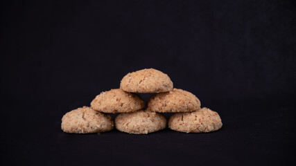 Homemade shortbread cookies on black background