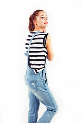 Obraz premium young pretty teenage hipster girl posing emotional happy smiling on white background, lifestyle people concept